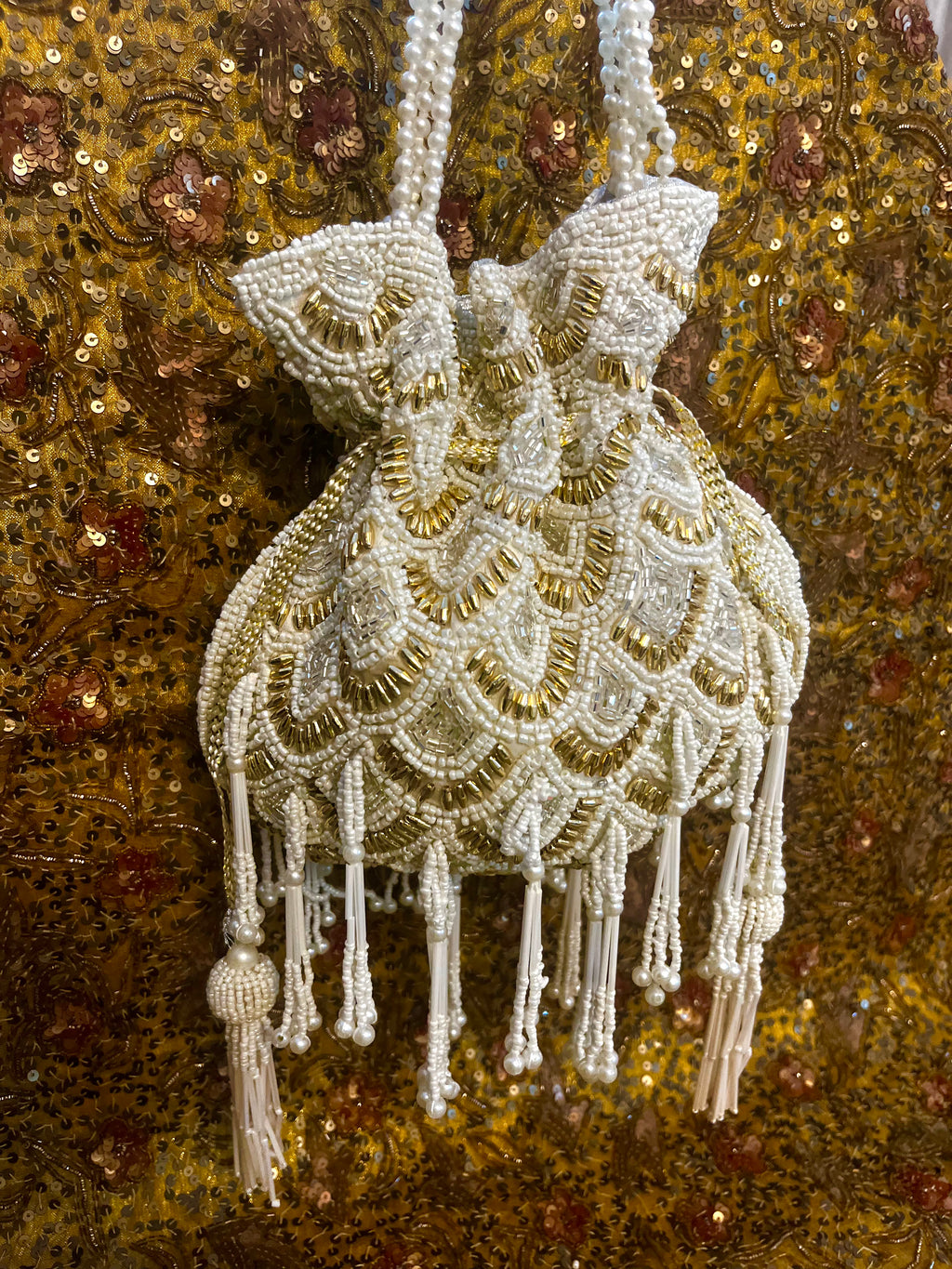 Pearly charm festive potli