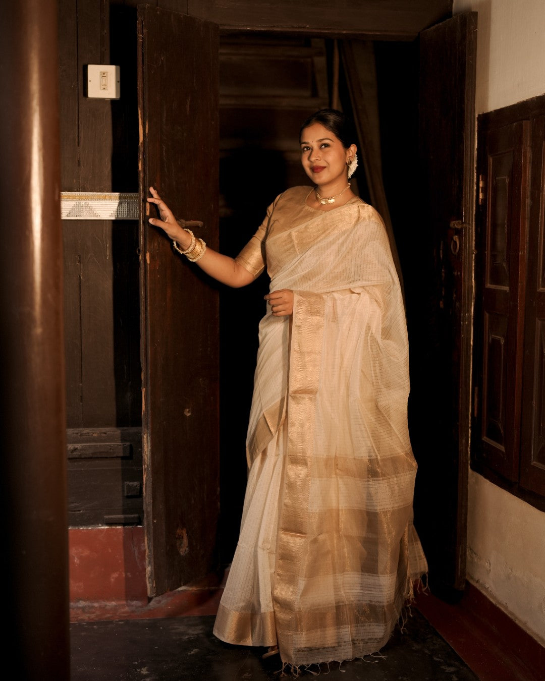Off white and gold maheshwari with zari checks all over