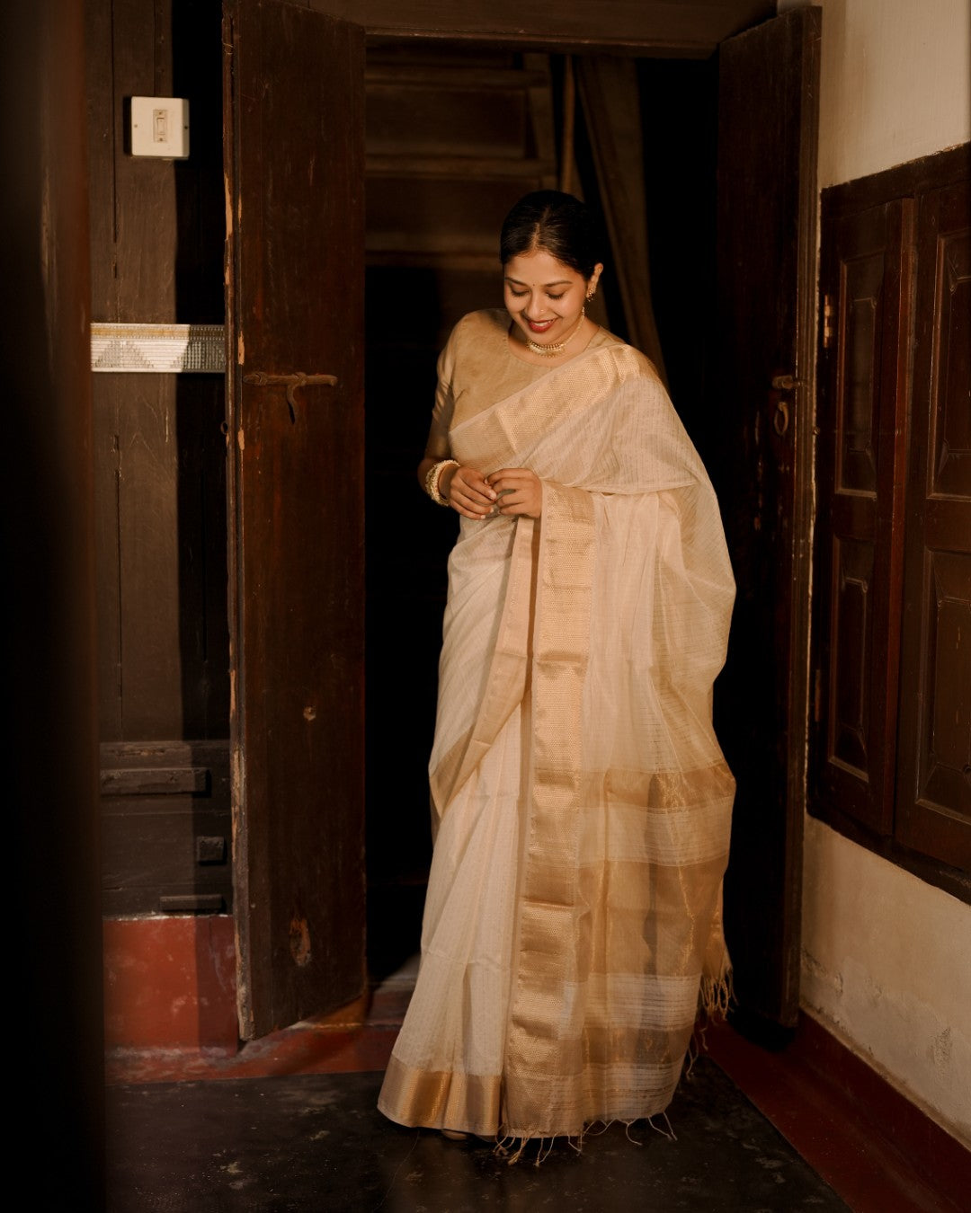 Off white and gold maheshwari with zari checks all over