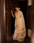 Off white and gold maheshwari with zari checks all over