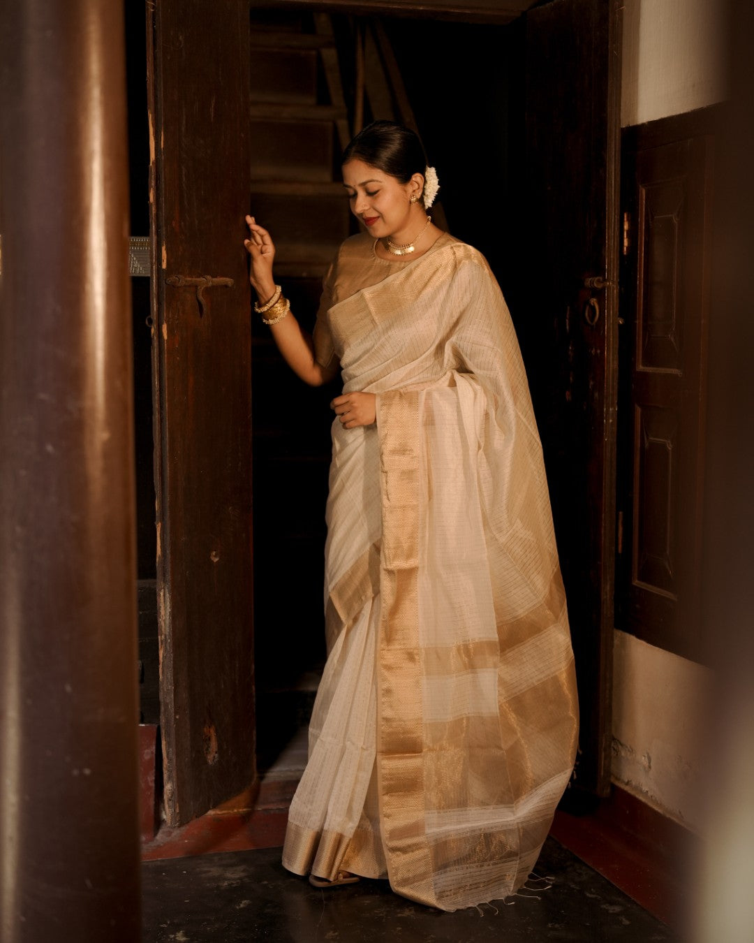 Off white and gold maheshwari with zari checks all over