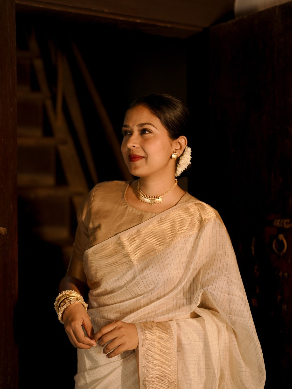 Off white and gold maheshwari with zari checks all over