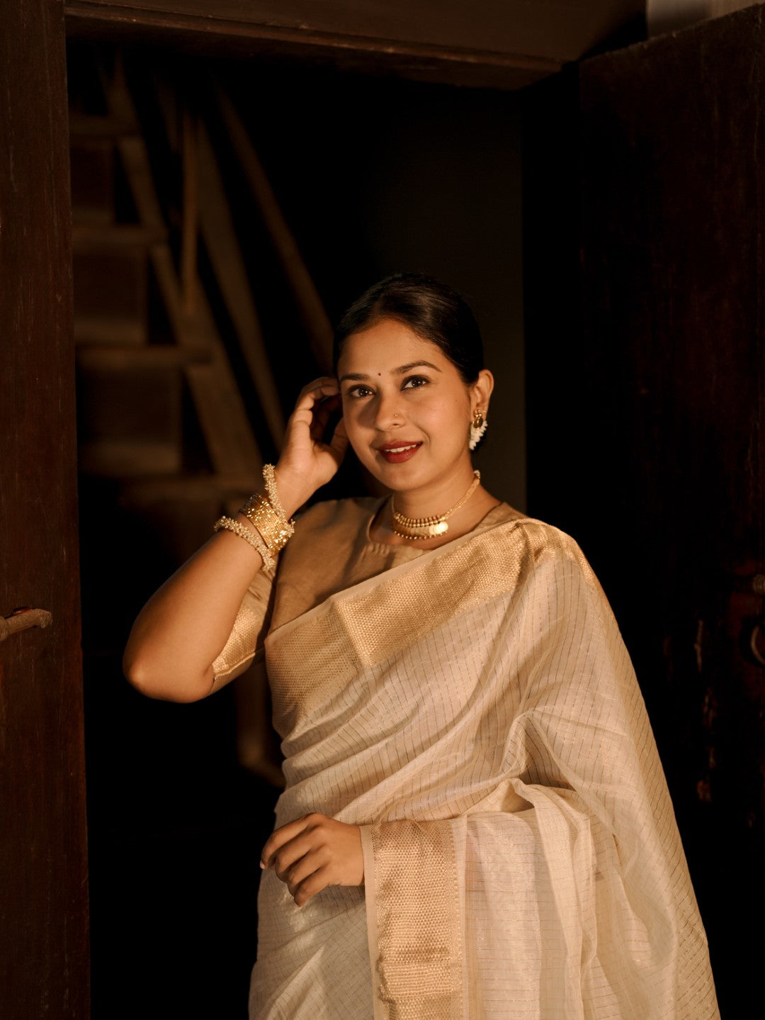 Off white and gold maheshwari with zari checks all over