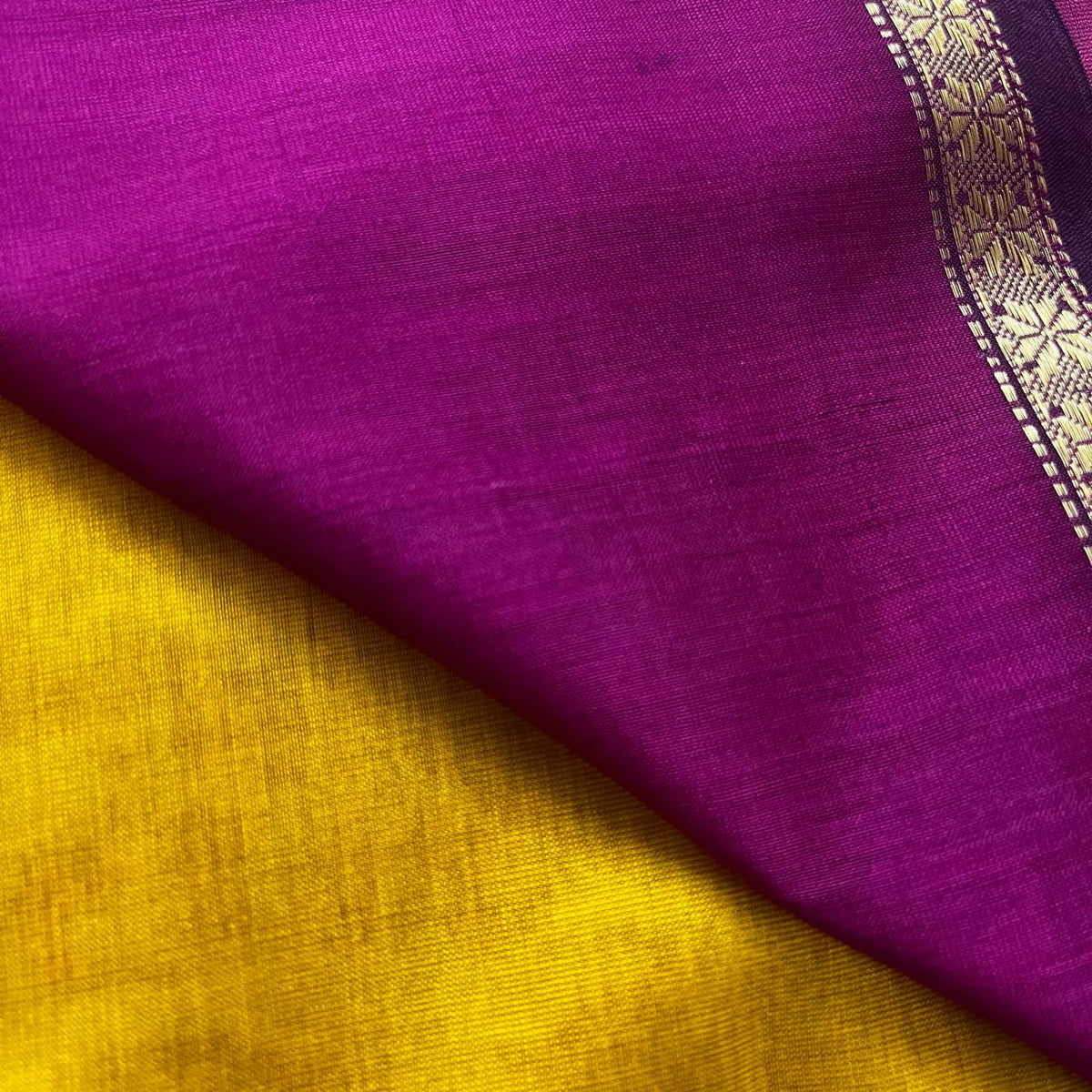 Mustard and pink maheshwari saree with flower bootis all over