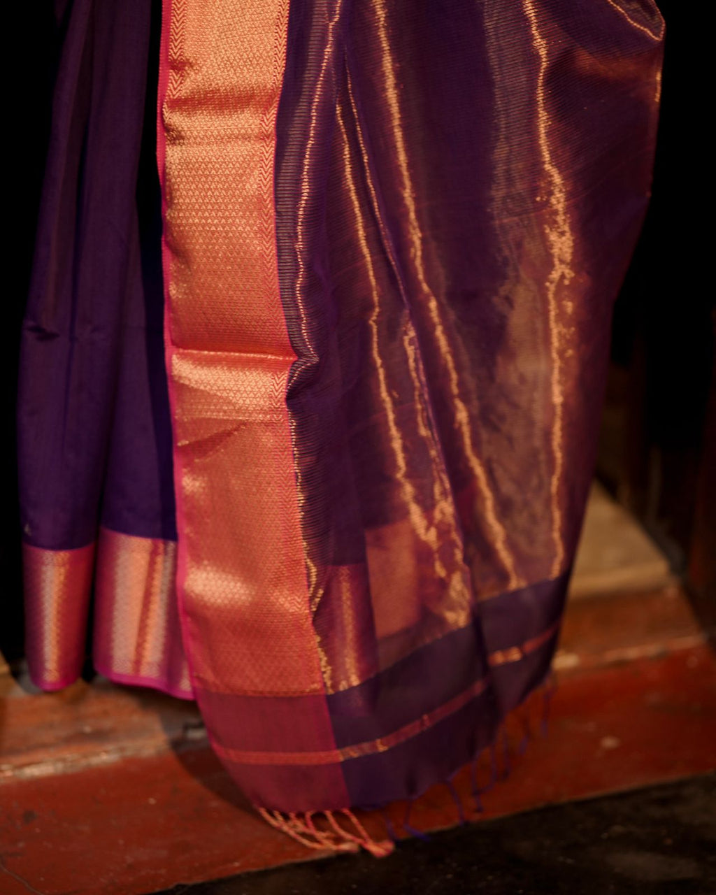 Dark purple and pink maheshwari saree with flower motifs all over