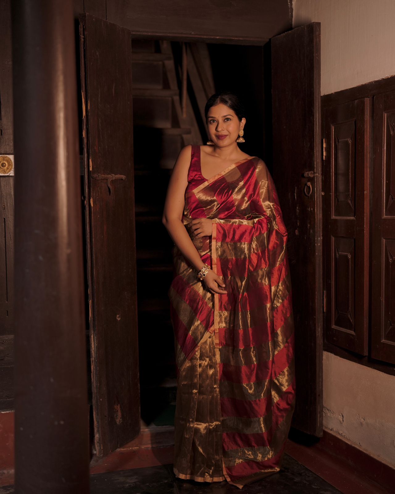 Deep maroon and gold chanderi saree with zari stripes