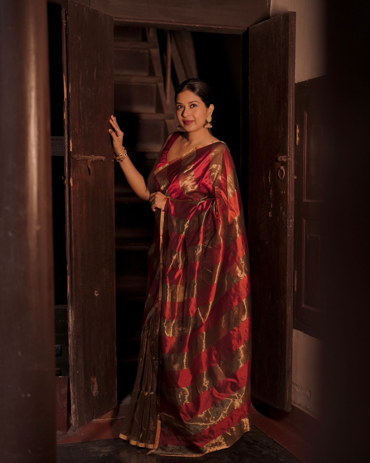 Deep maroon and gold chanderi saree with zari stripes