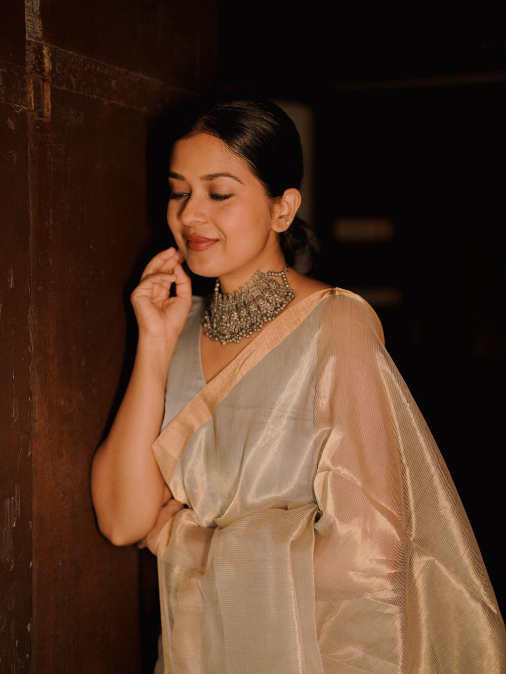 Grey and gold Maheshwari saree with zari lines all over