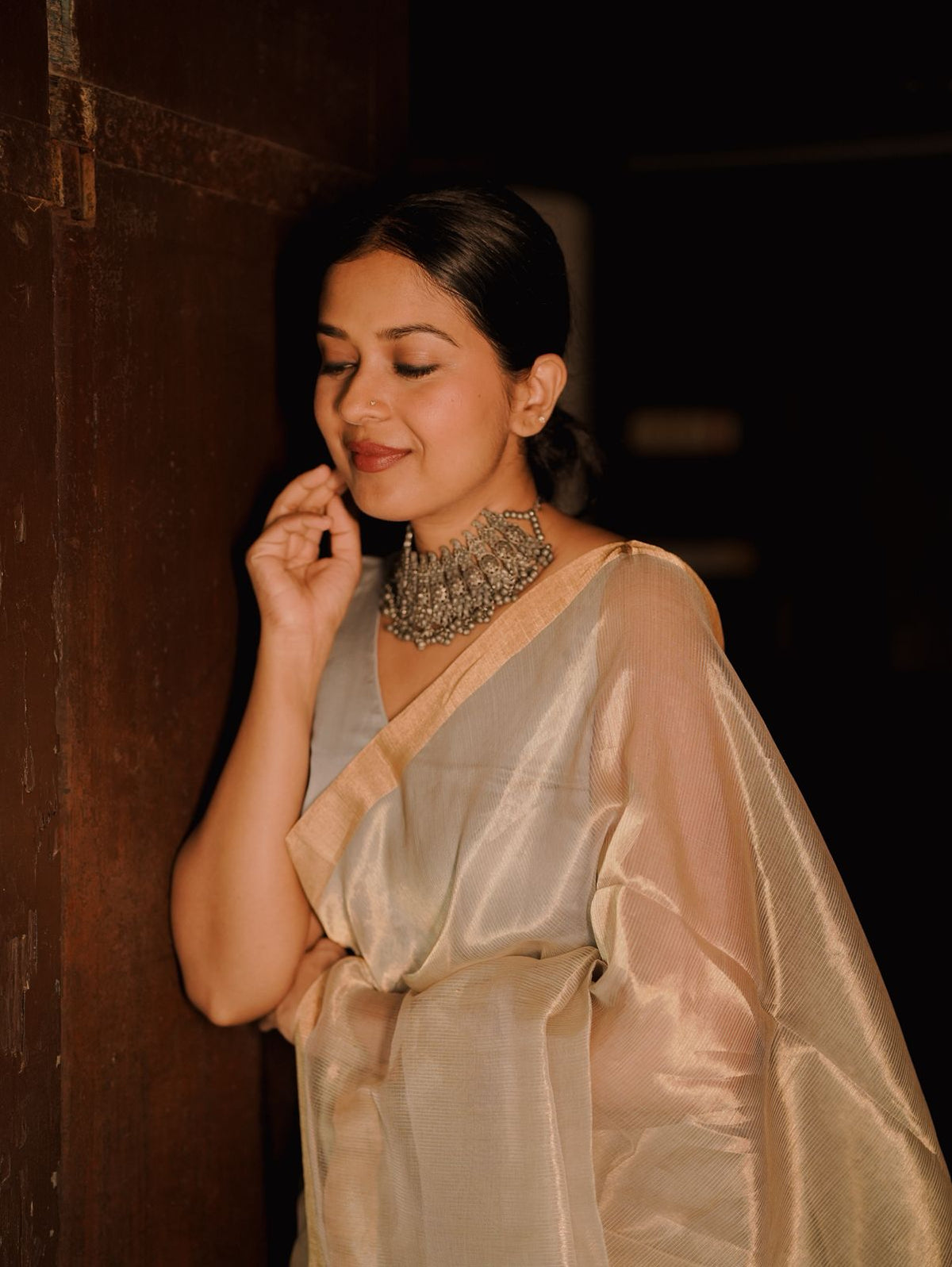Grey and gold Maheshwari saree with zari lines all over