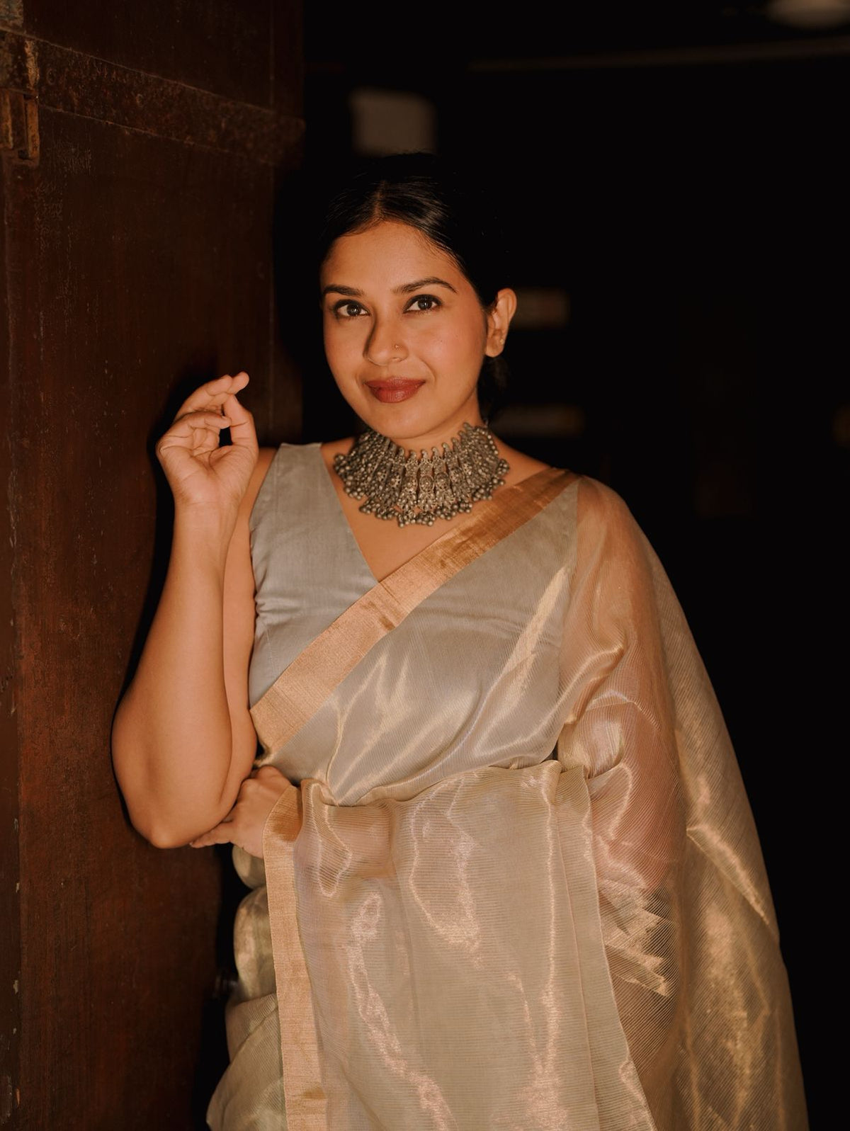 Grey and gold Maheshwari saree with zari lines all over