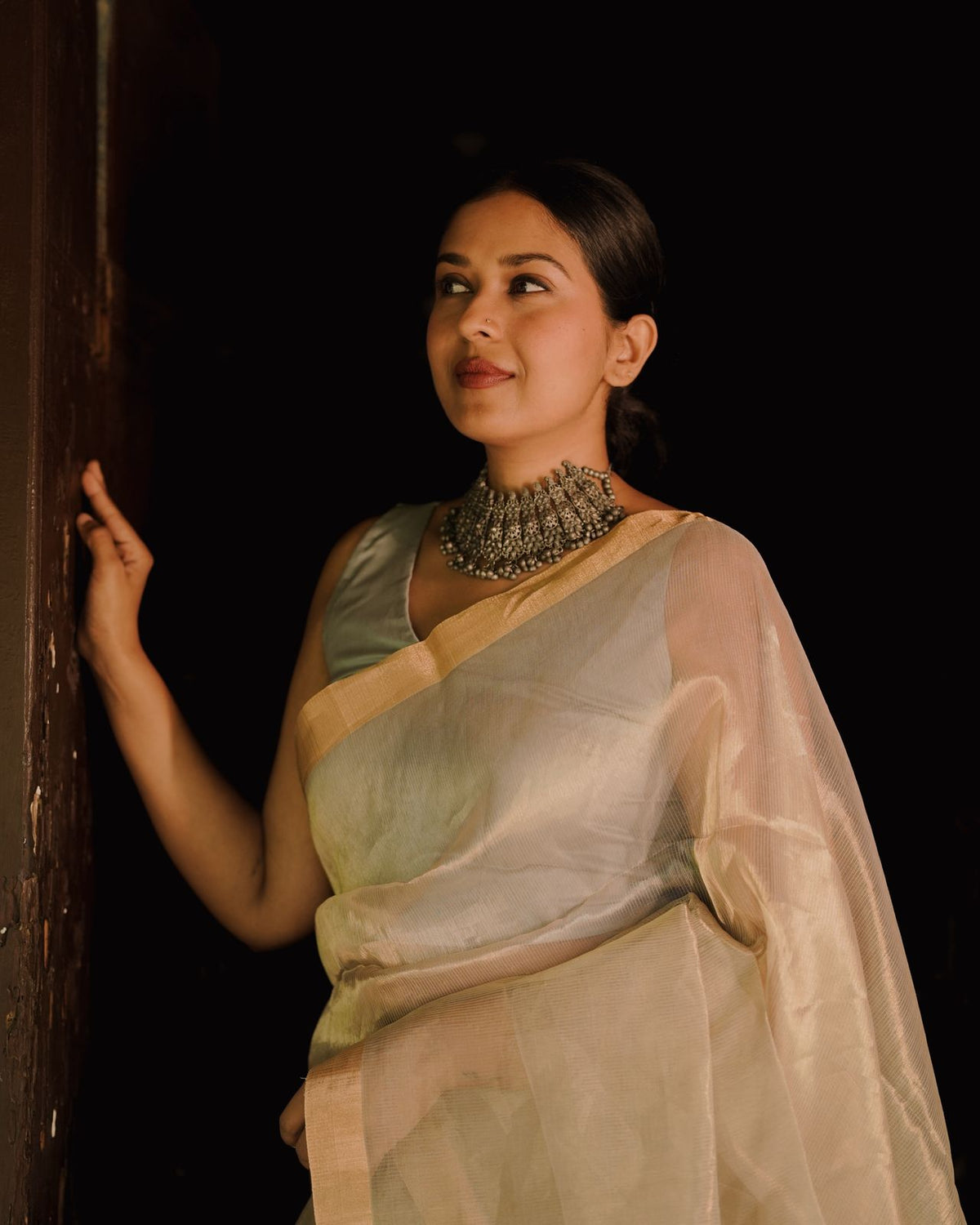 Grey and gold Maheshwari saree with zari lines all over