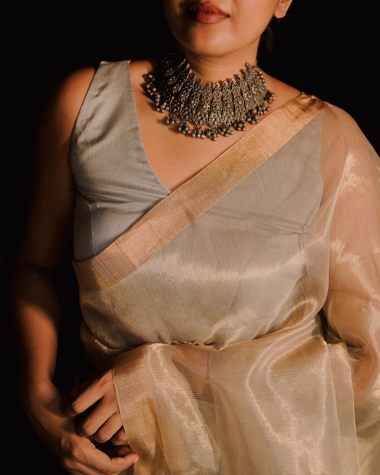 Grey and gold Maheshwari saree with zari lines all over