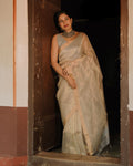 Grey and gold Maheshwari saree with zari lines all over
