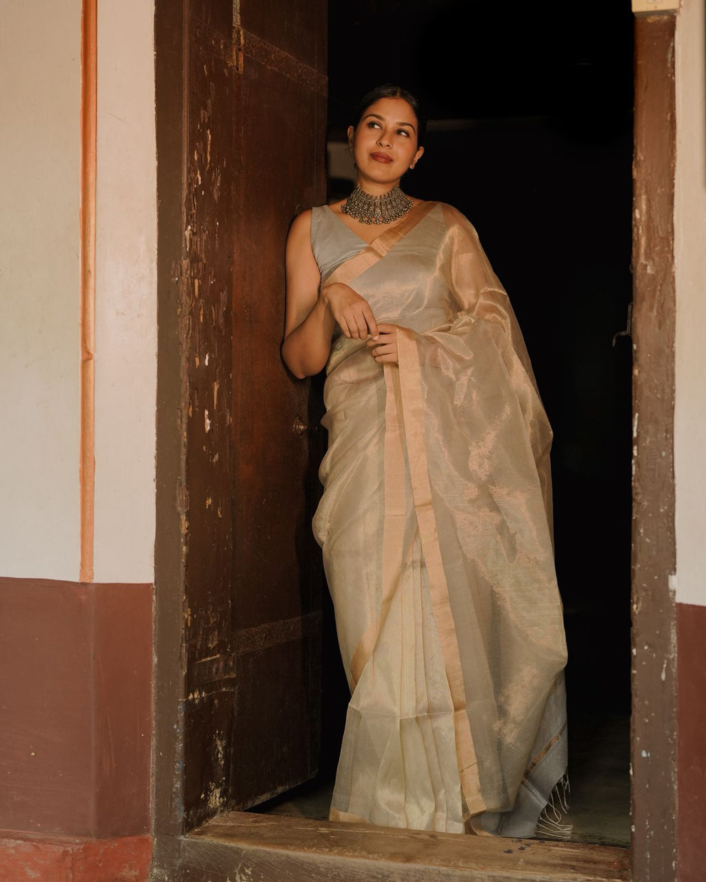 Grey and gold Maheshwari saree with zari lines all over