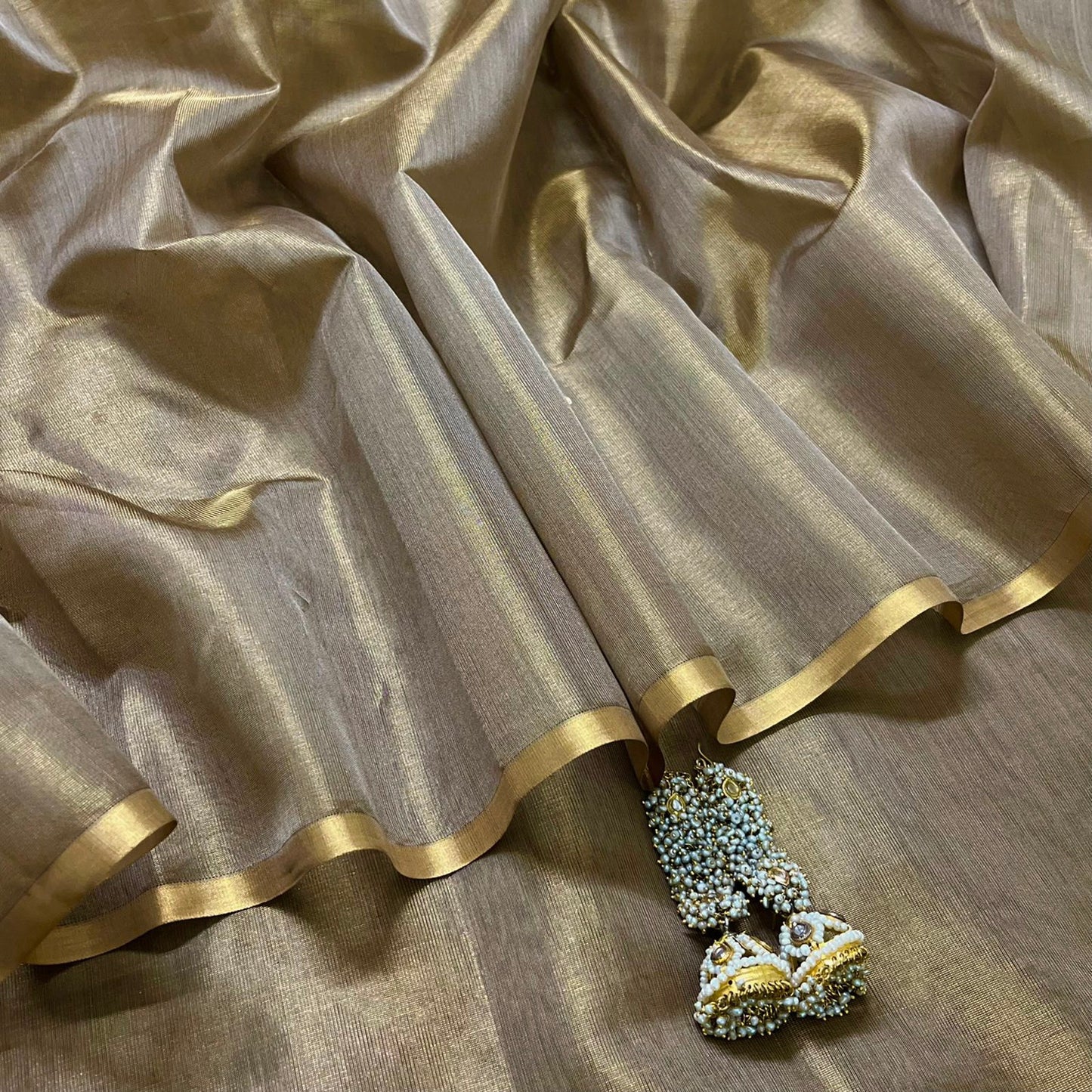 Antique gold maheshwari tissue silk saree with zari bootis all over