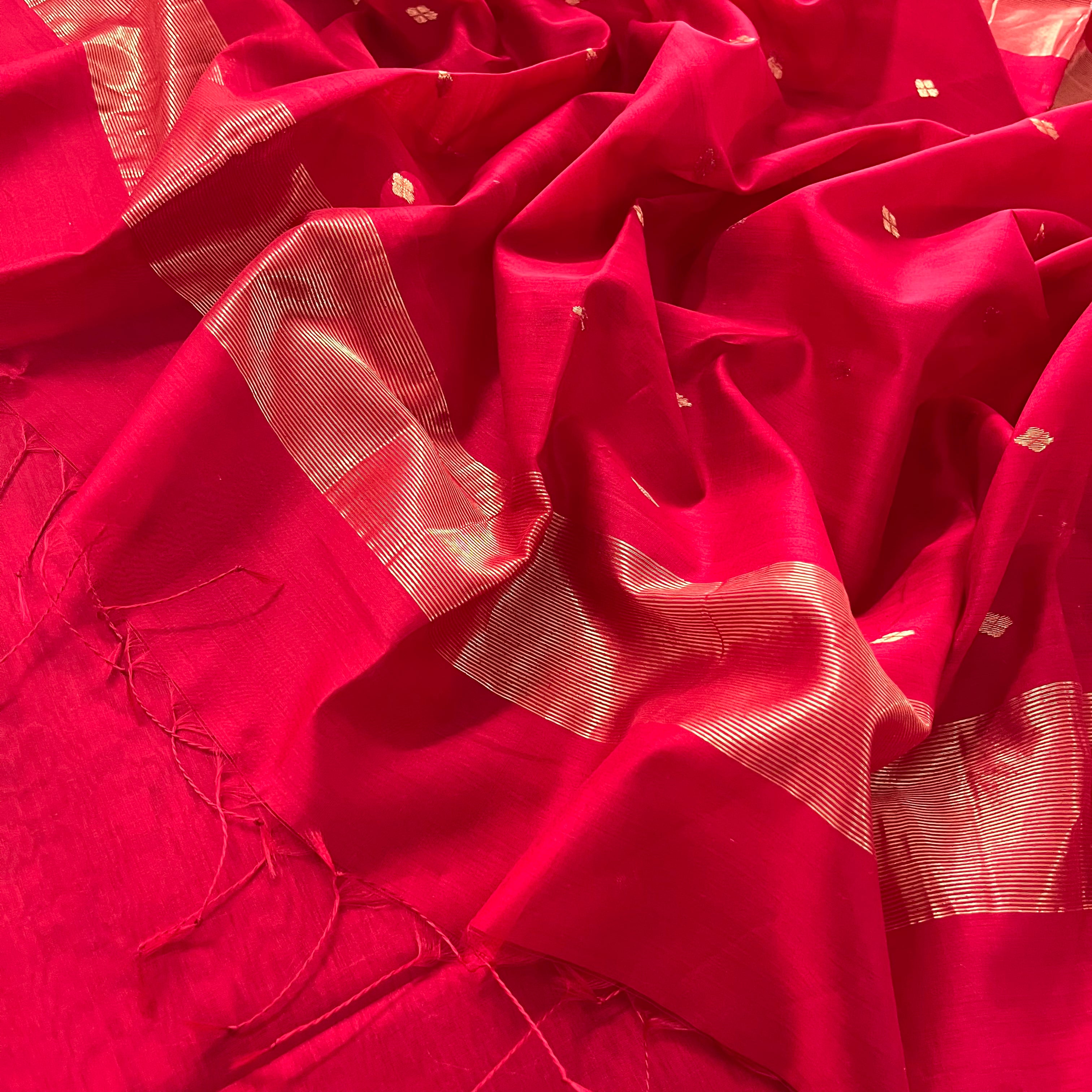 Deep red maheshwari saree with zari bootis all over