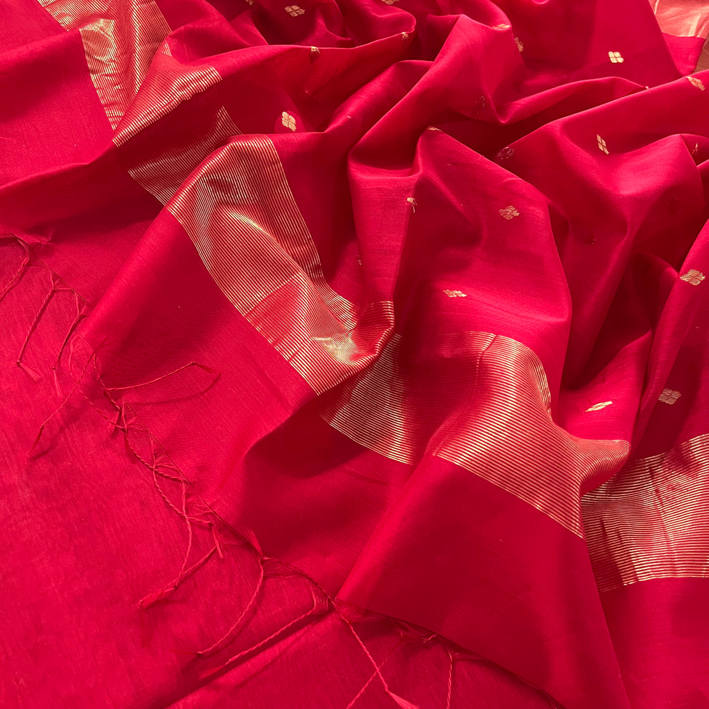 Deep red maheshwari saree with zari bootis all over