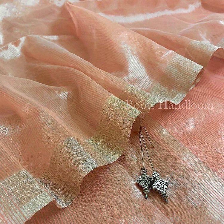 Peachish Pink Maheshwari saree with Silver Zari lines all over
