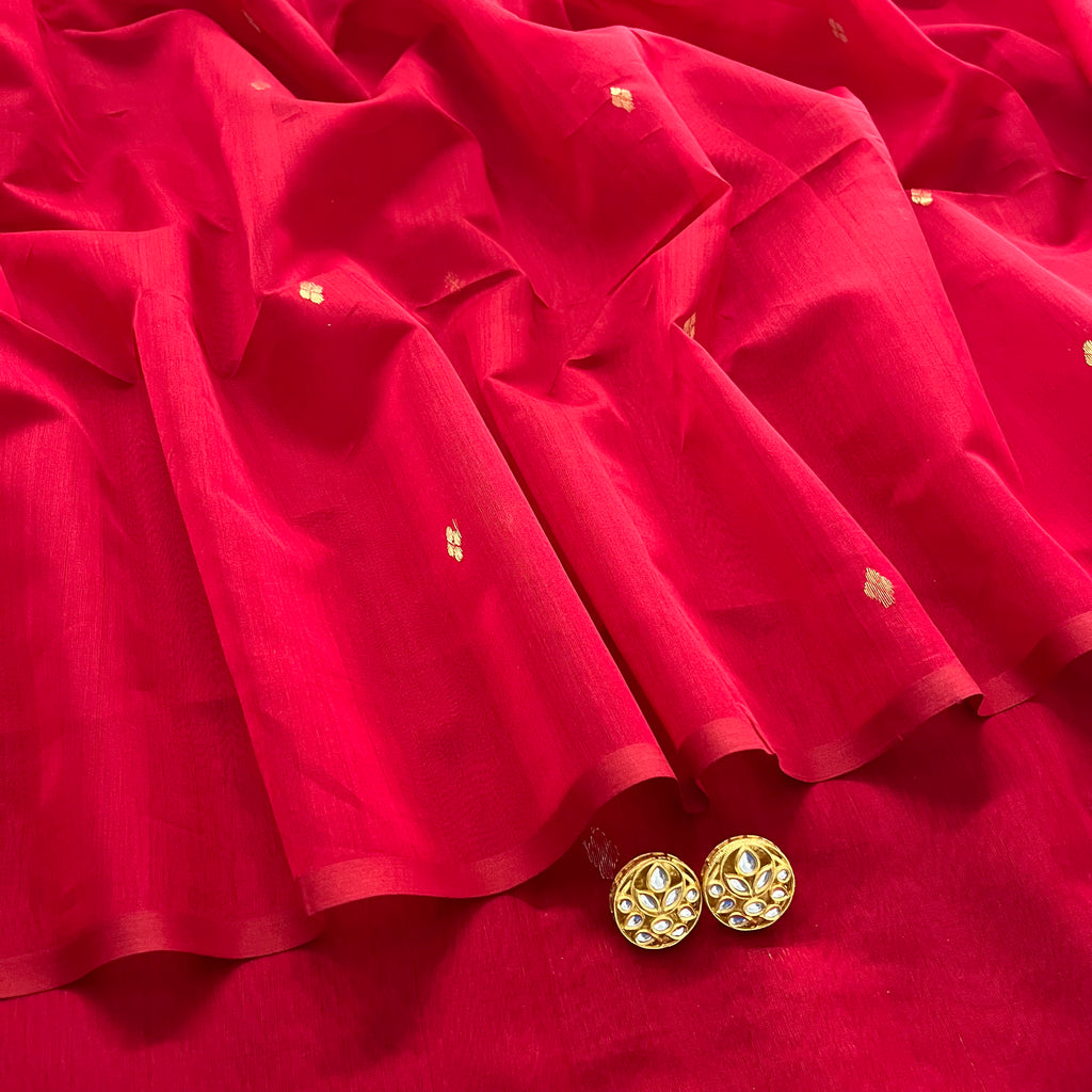 Deep red maheshwari saree with zari bootis all over